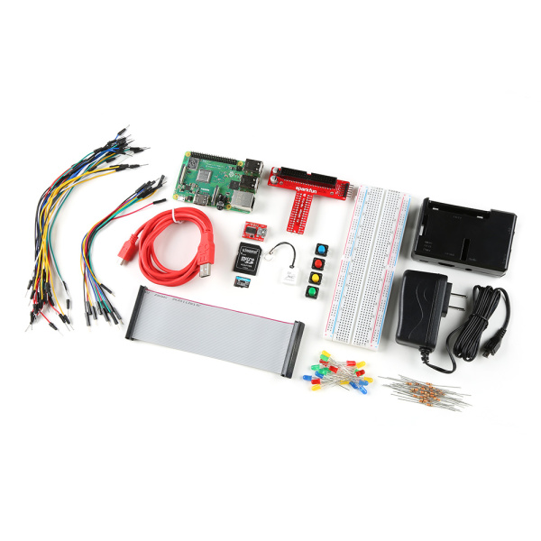 Een minicomputer met een breadboard, draden, een voeding en een behuizing naast elkaar